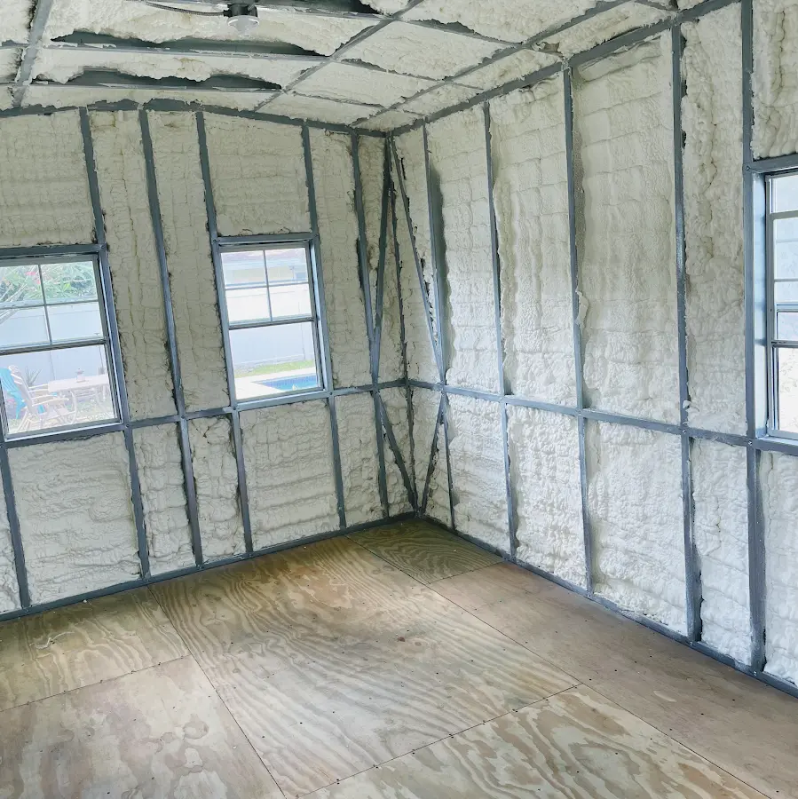 Closed-cell spray foam insulation applied to wall cavities in a residential project in Providence